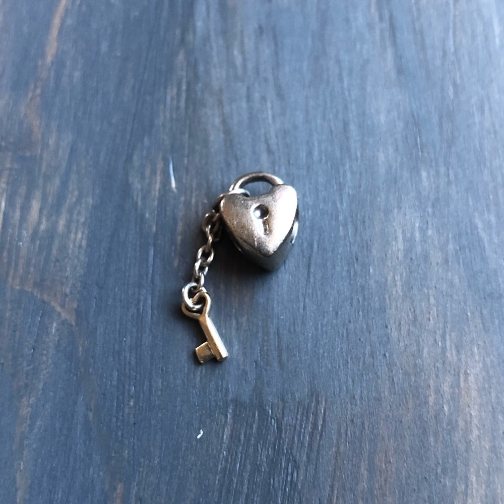 Pandora gold key to my heart charm.